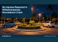 Conceptual editorial illustration: Two generic compact cars parked with safe separation beside a small Caribbean roundabout at night, amber street lamps and deep teal sky, wide eye-level composition. Not a photograph of the actual people, event or location.